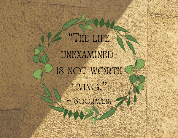 Socrates quote within green vones on stone