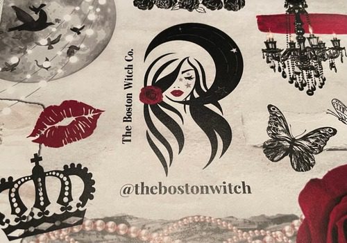 red, black and ivory business card with woman, crown, butterfly, rose, and various objects