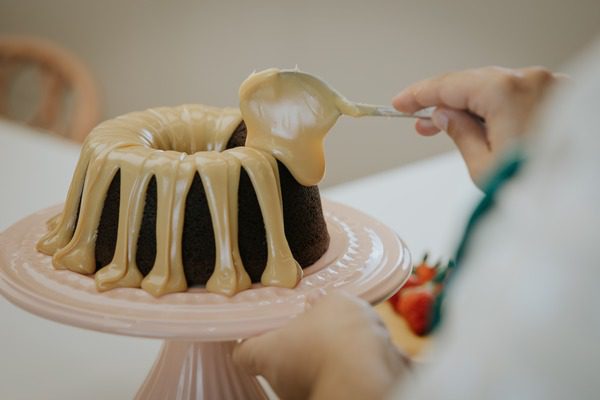 chocolate bundt cake with vanilla drizzle